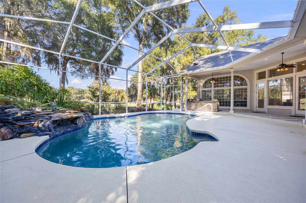 4606 Southwest 97th Terrace Gainesville, FL 32608 - Photo 54 of 68 a view of a swimming pool with a patio