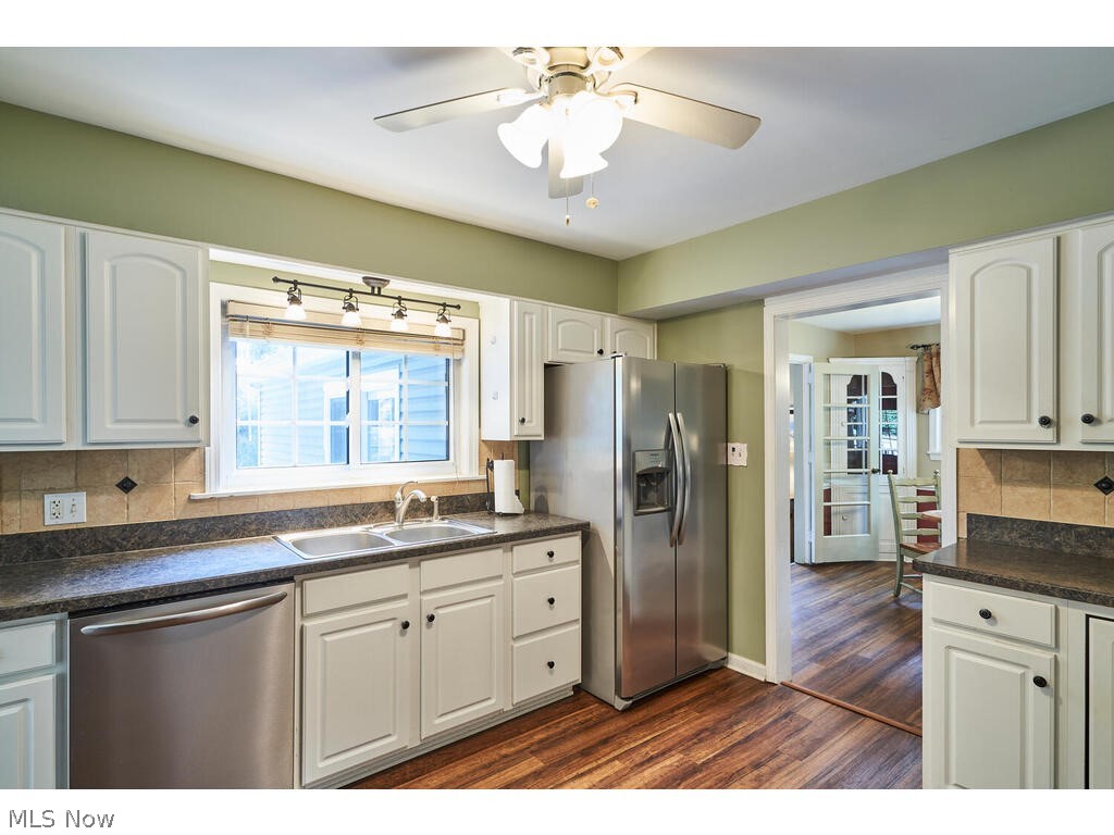 616 Hampshire Road Fairlawn, OH 44333 - Photo 10 of 32 Wonderful kitchen- with updated white cabinets, flooring and stainless steel appliances!