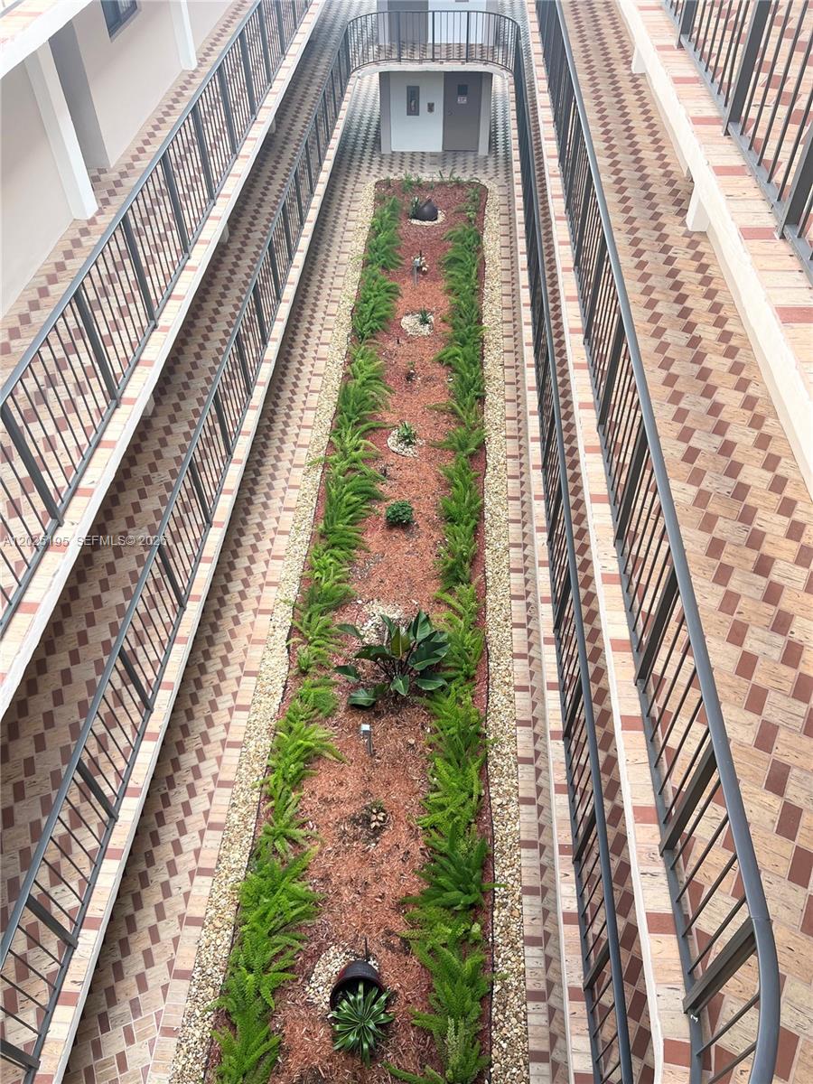 8400 Southwest 133rd Avenue Road, Unit 121 Miami, FL 33183 - Photo 19 of 43 a view of a yard with staircase