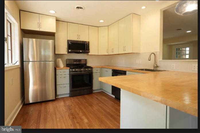 2 Snuff Mill Road Wilmington, DE 19807 - Photo 11 of 36 Modern kitchen with sleek finishes.