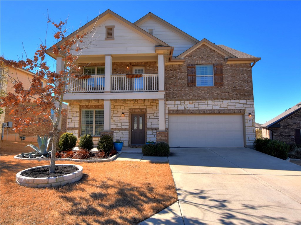 361 Stone View Trail Austin, TX 78737 - Photo 1 of 1 a front view of a house with a yard