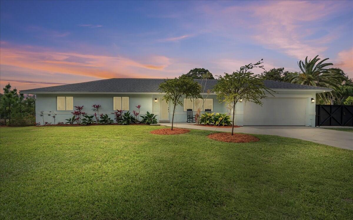 19724 Southwest 243rd Terrace Homestead, FL 33031 - Photo 3 of 49 a view of an house with backyard space and balcony