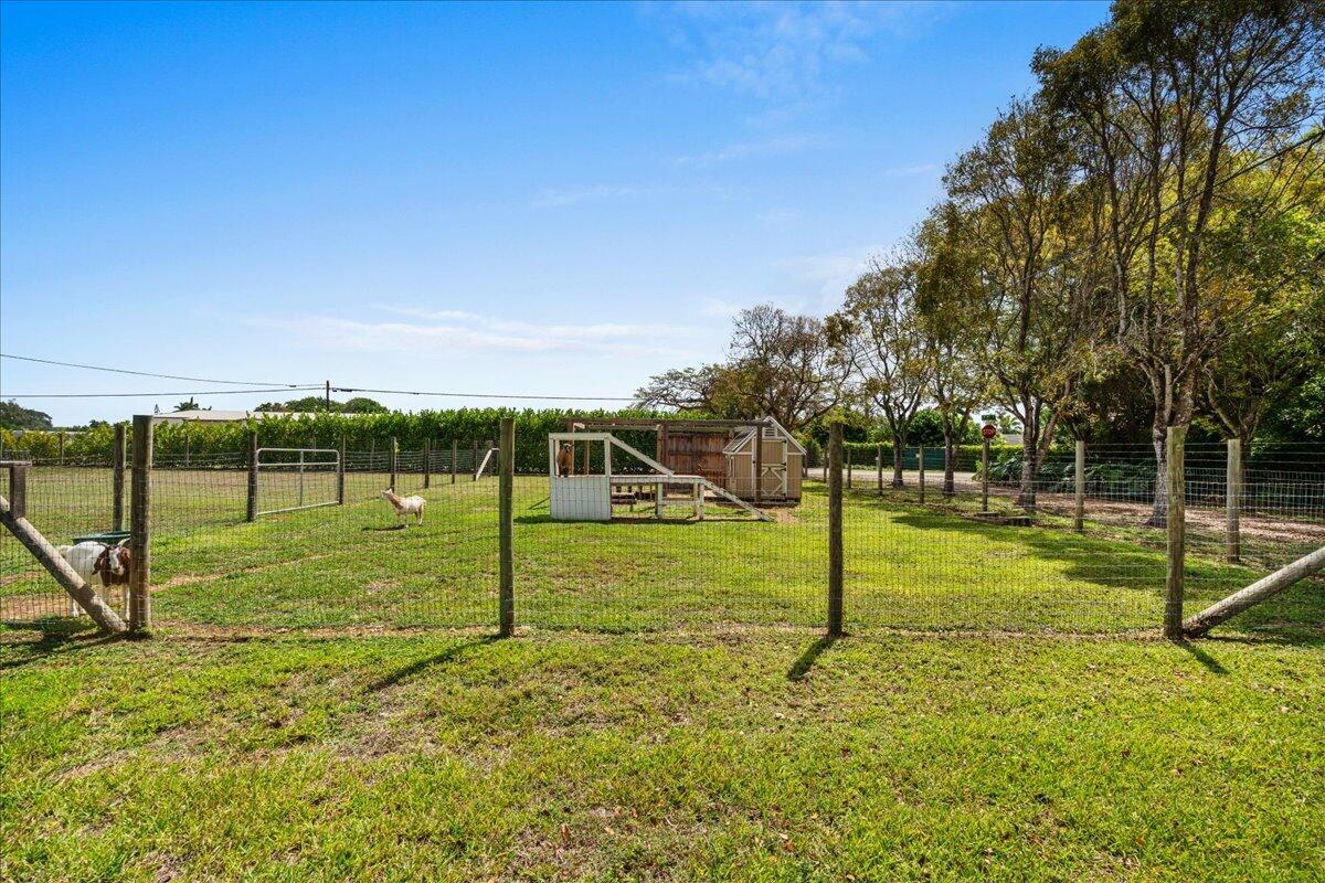 19724 Southwest 243rd Terrace Homestead, FL 33031 - Photo 34 of 49 a view of a park with swings