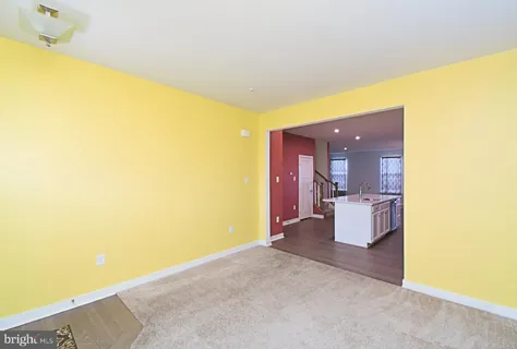 a view of a living room with a large window
