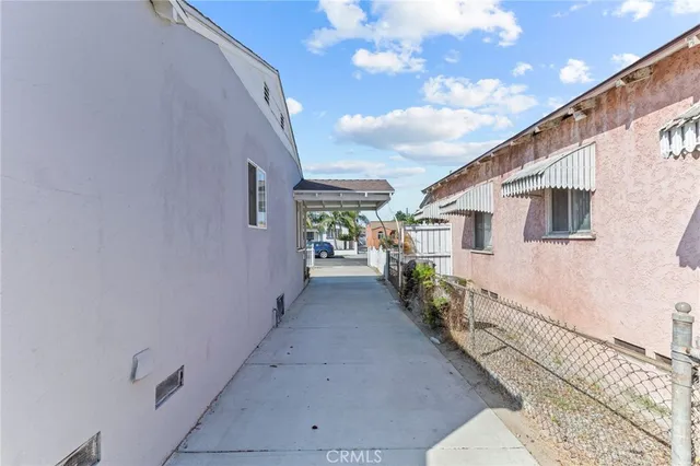 a view of a house with a tree