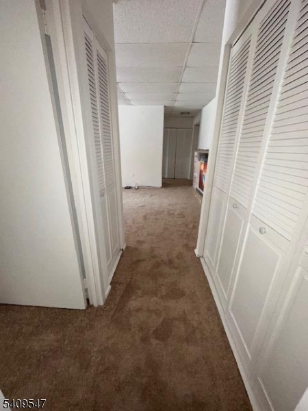77 Prospect Avenue, Unit A Hackensack, NJ 07601 - Photo 8 of 16 a view of a room with door
