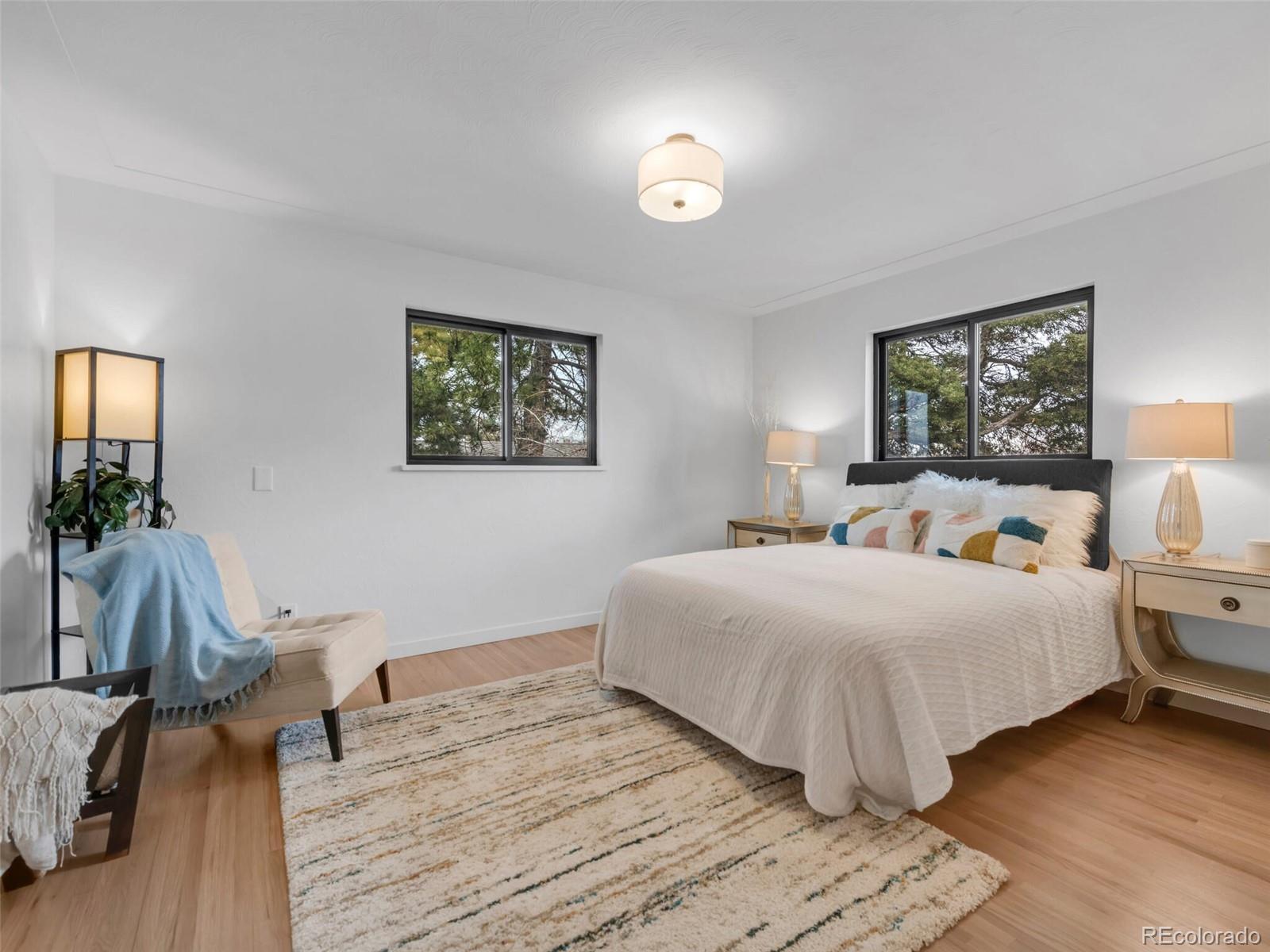 1345 Overhill Road Golden, CO 80401 - Photo 13 of 40 a bedroom with bed and a window
