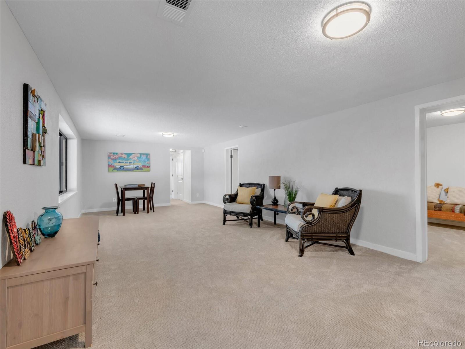 1345 Overhill Road Golden, CO 80401 - Photo 20 of 40 a living room with furniture and a table