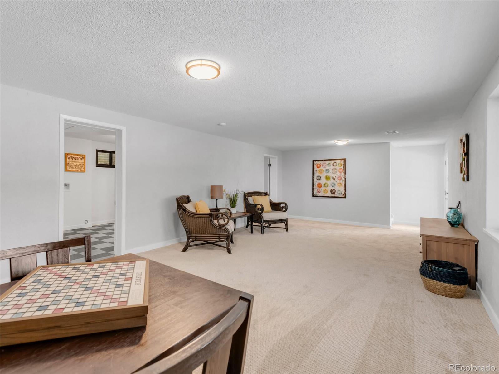 1345 Overhill Road Golden, CO 80401 - Photo 22 of 40 a living room with furniture and a couch