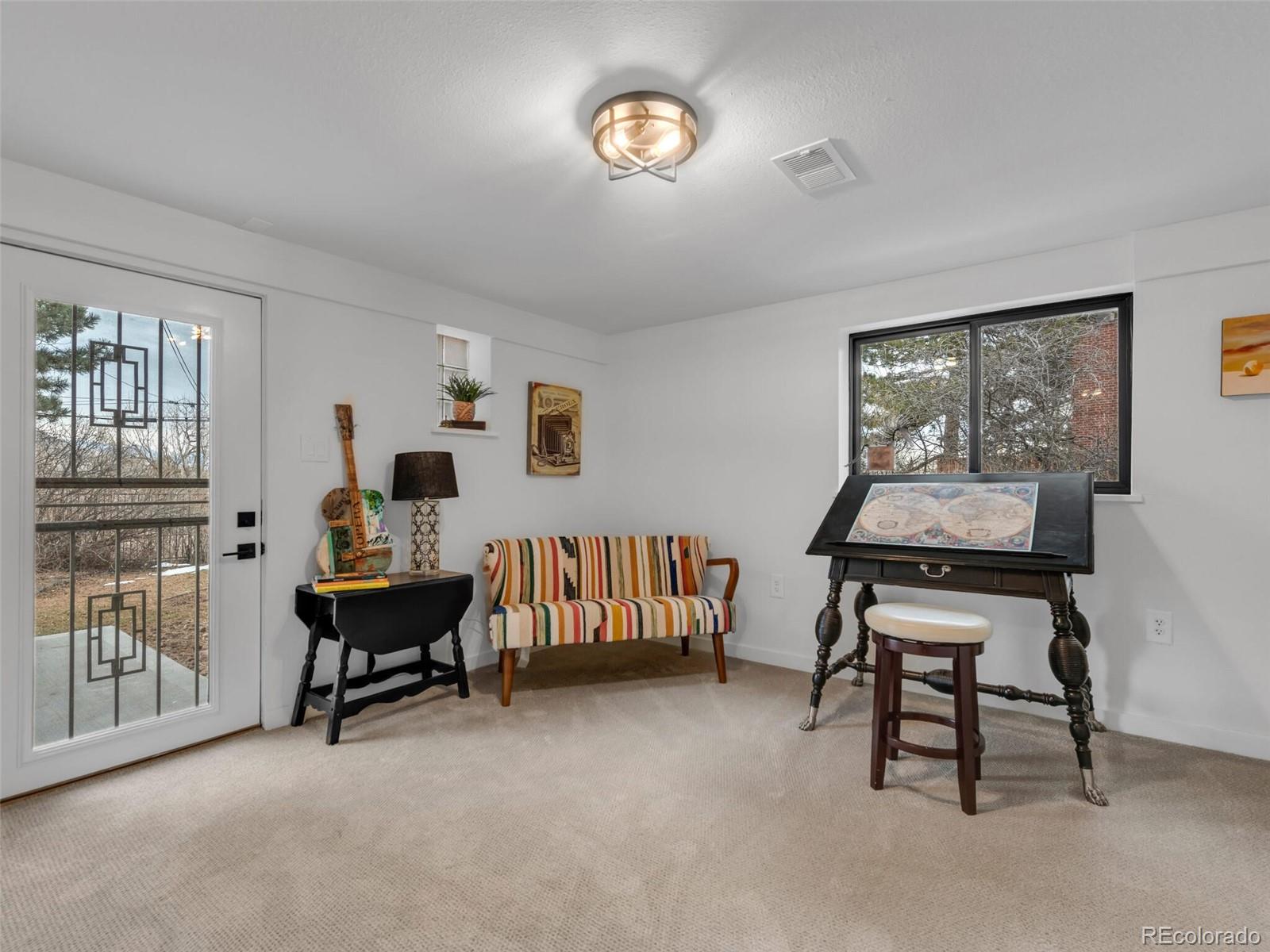 1345 Overhill Road Golden, CO 80401 - Photo 24 of 40 a living room with furniture and a window