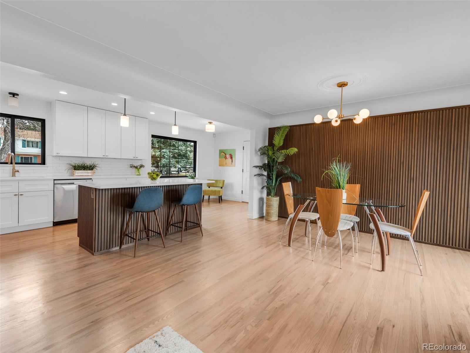 1345 Overhill Road Golden, CO 80401 - Photo 28 of 40 a view of a dining room with furniture and wooden floor