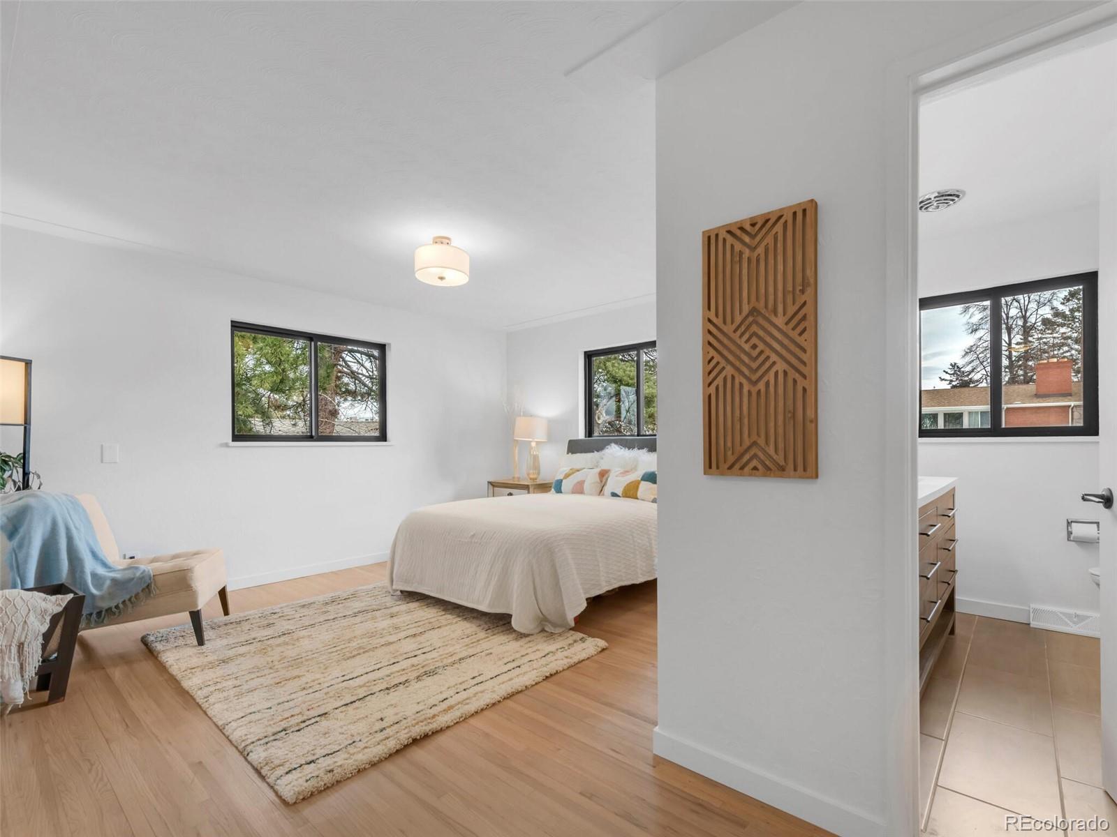 1345 Overhill Road Golden, CO 80401 - Photo 31 of 40 a bedroom with a bed and a couch