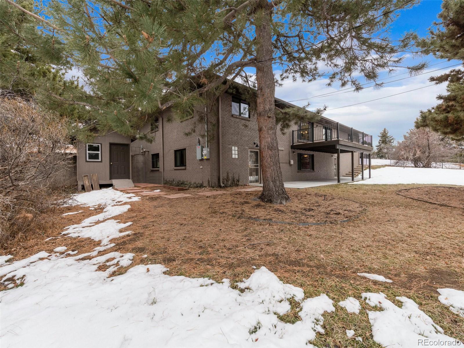 1345 Overhill Road Golden, CO 80401 - Photo 39 of 40 a view of a house with a yard