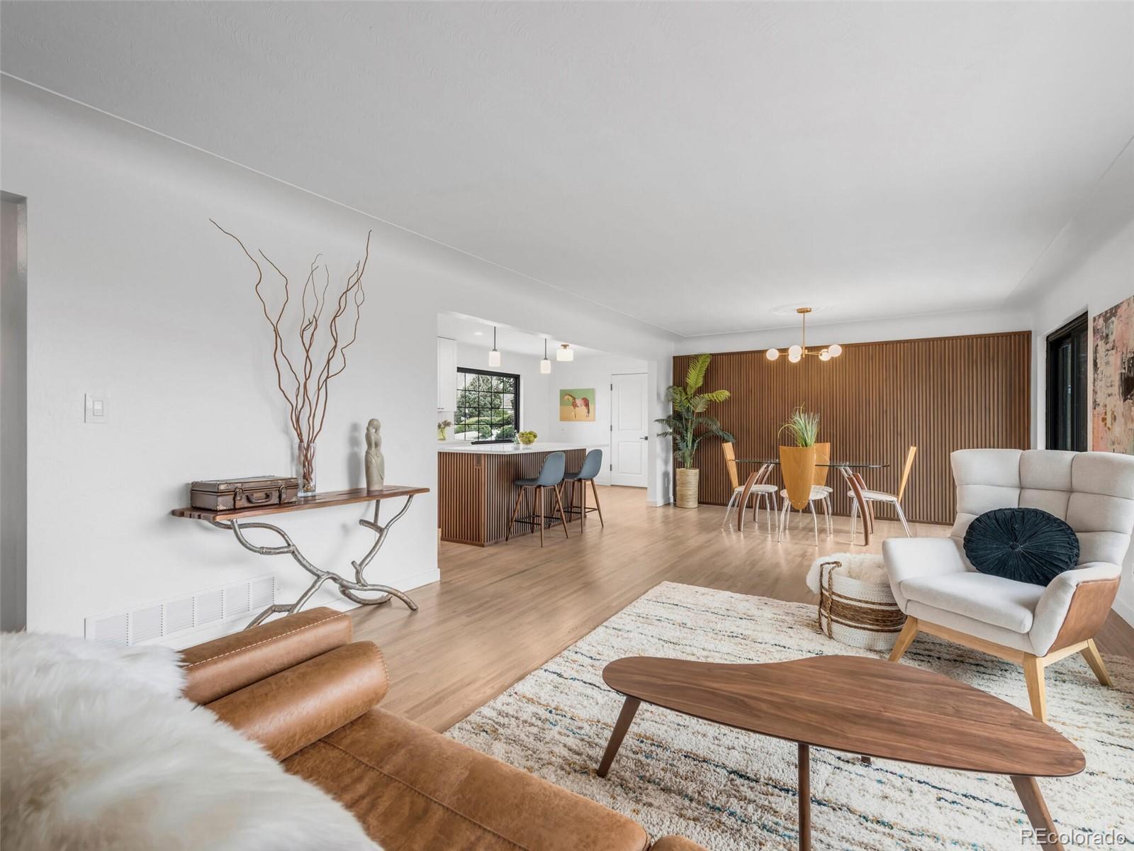 1345 Overhill Road Golden, CO 80401 - Photo 10 of 40 a living room with furniture and wooden floor
