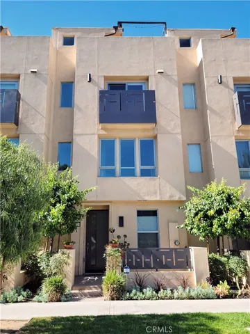 a front view of a house with yard