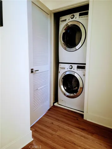 a view of a hallway with washer and dryer