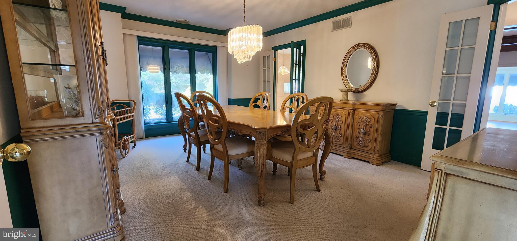 4069 West Tilden Road Harrisburg, PA 17110 - Photo 12 of 56 a view of a dining room with furniture and a large window