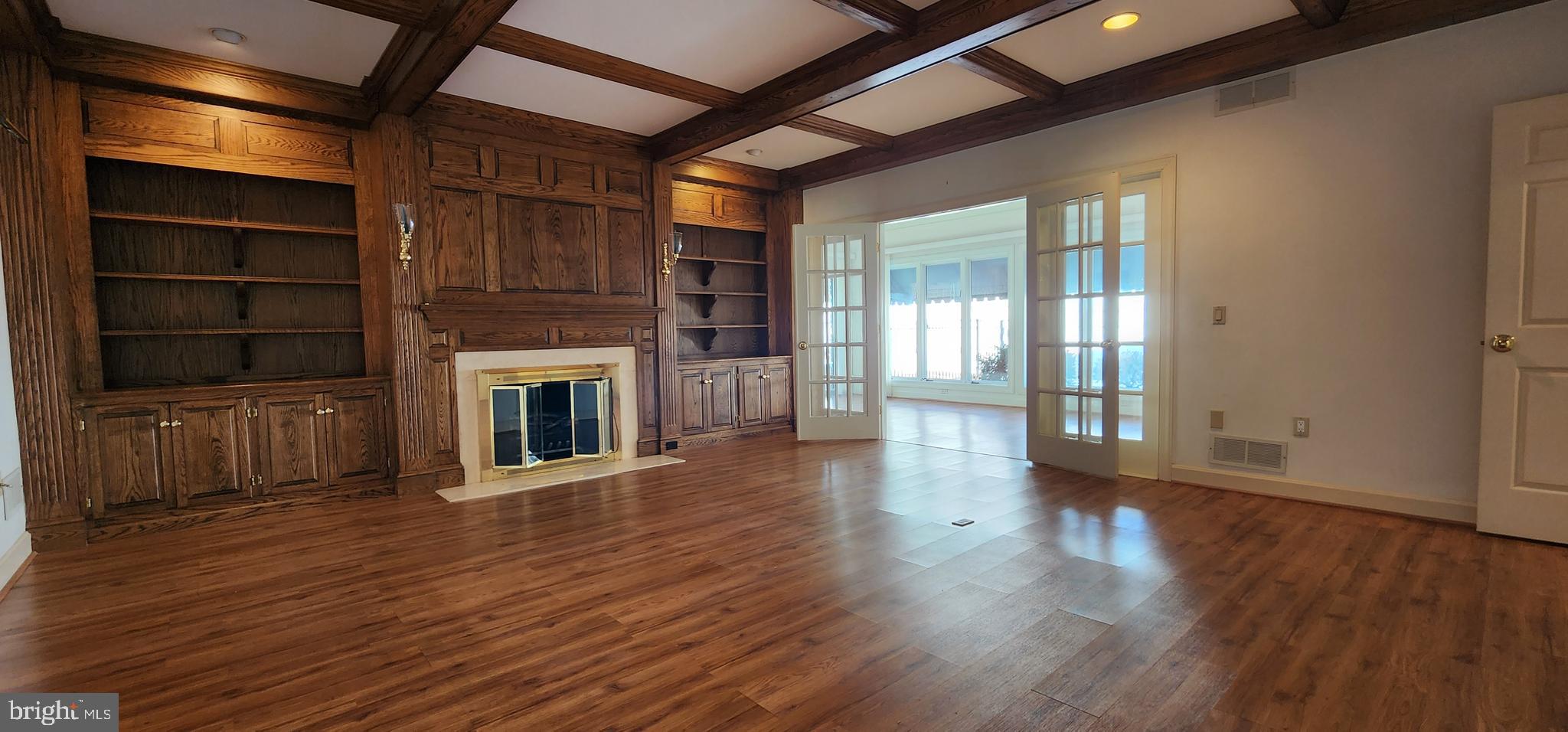 4069 West Tilden Road Harrisburg, PA 17110 - Photo 18 of 56 a view of an empty room with wooden floor and a window
