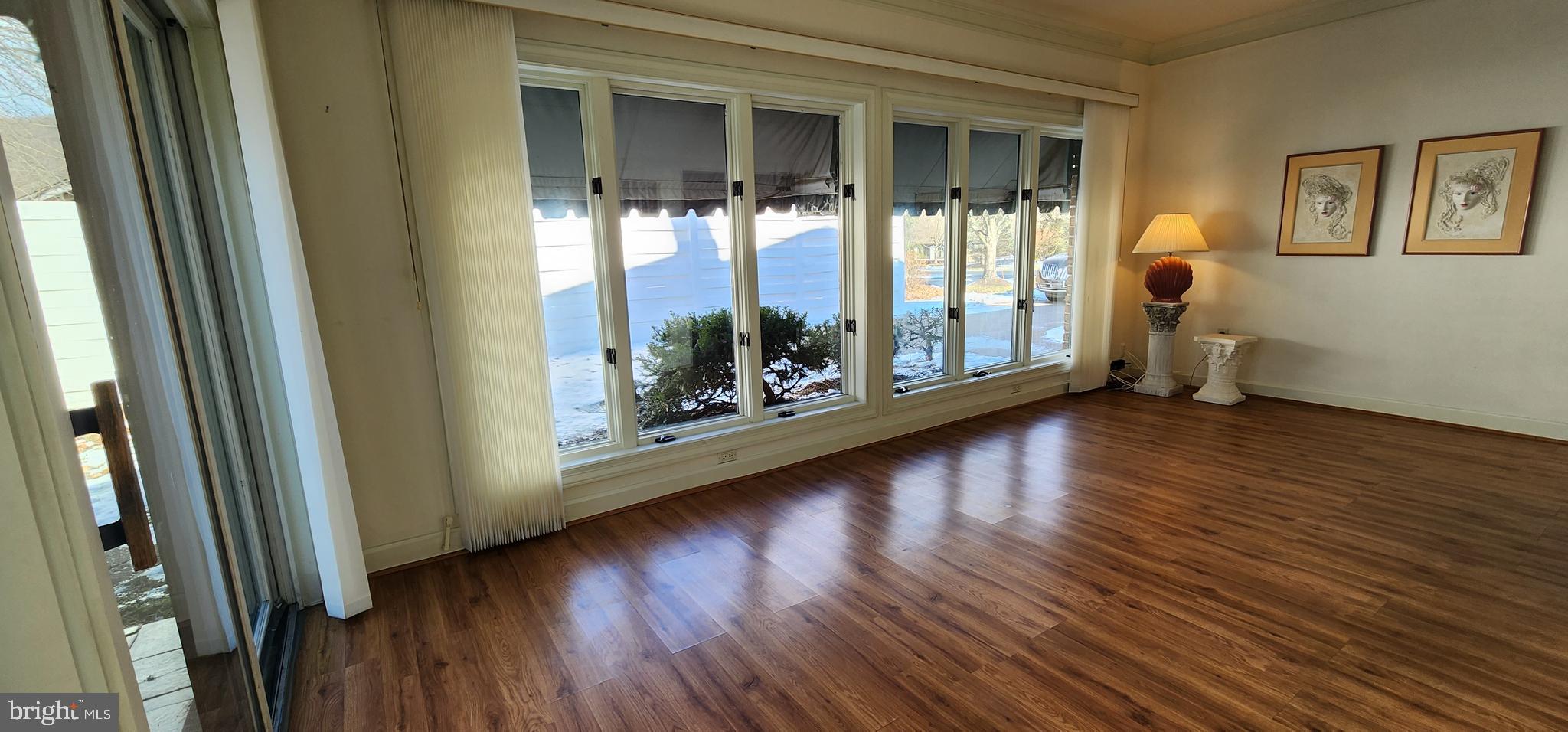4069 West Tilden Road Harrisburg, PA 17110 - Photo 21 of 56 a view of a room with wooden floor and door
