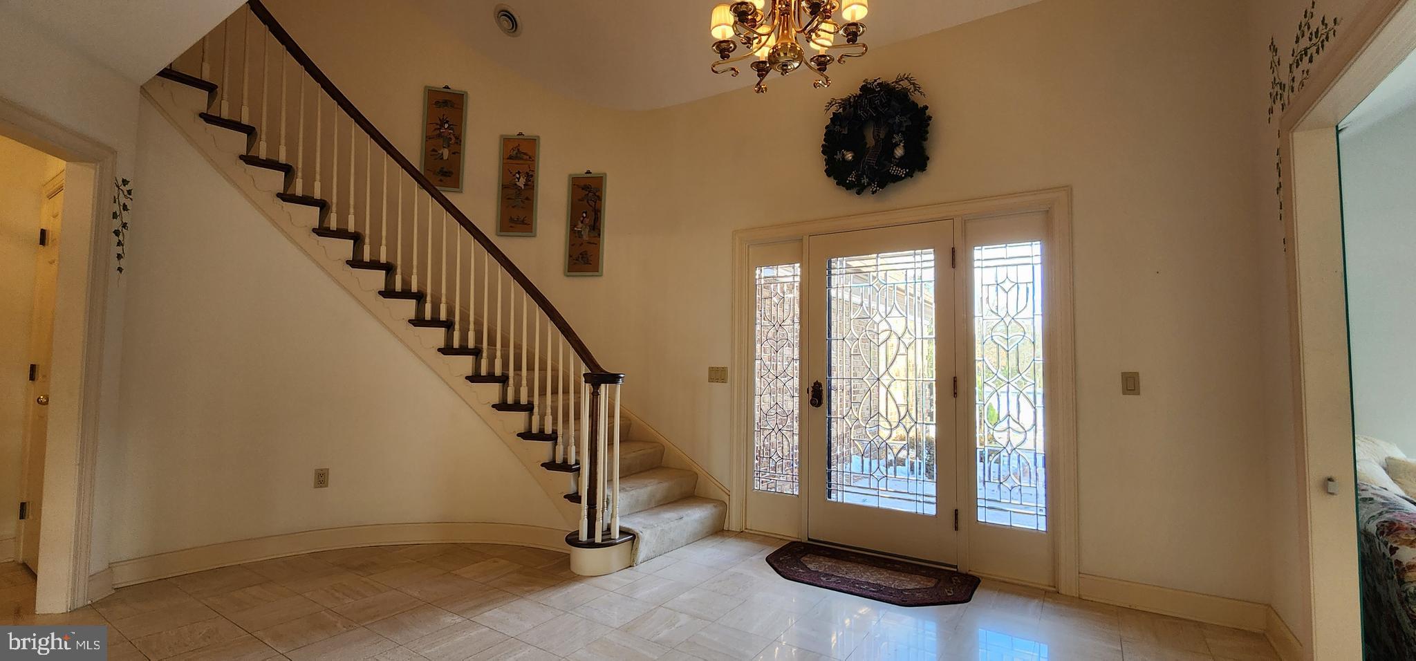 4069 West Tilden Road Harrisburg, PA 17110 - Photo 3 of 56 a view of an entryway with wooden floor and windows