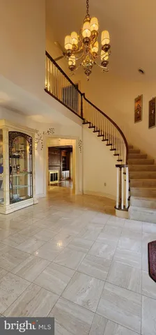 a view of an entryway with a chandelier