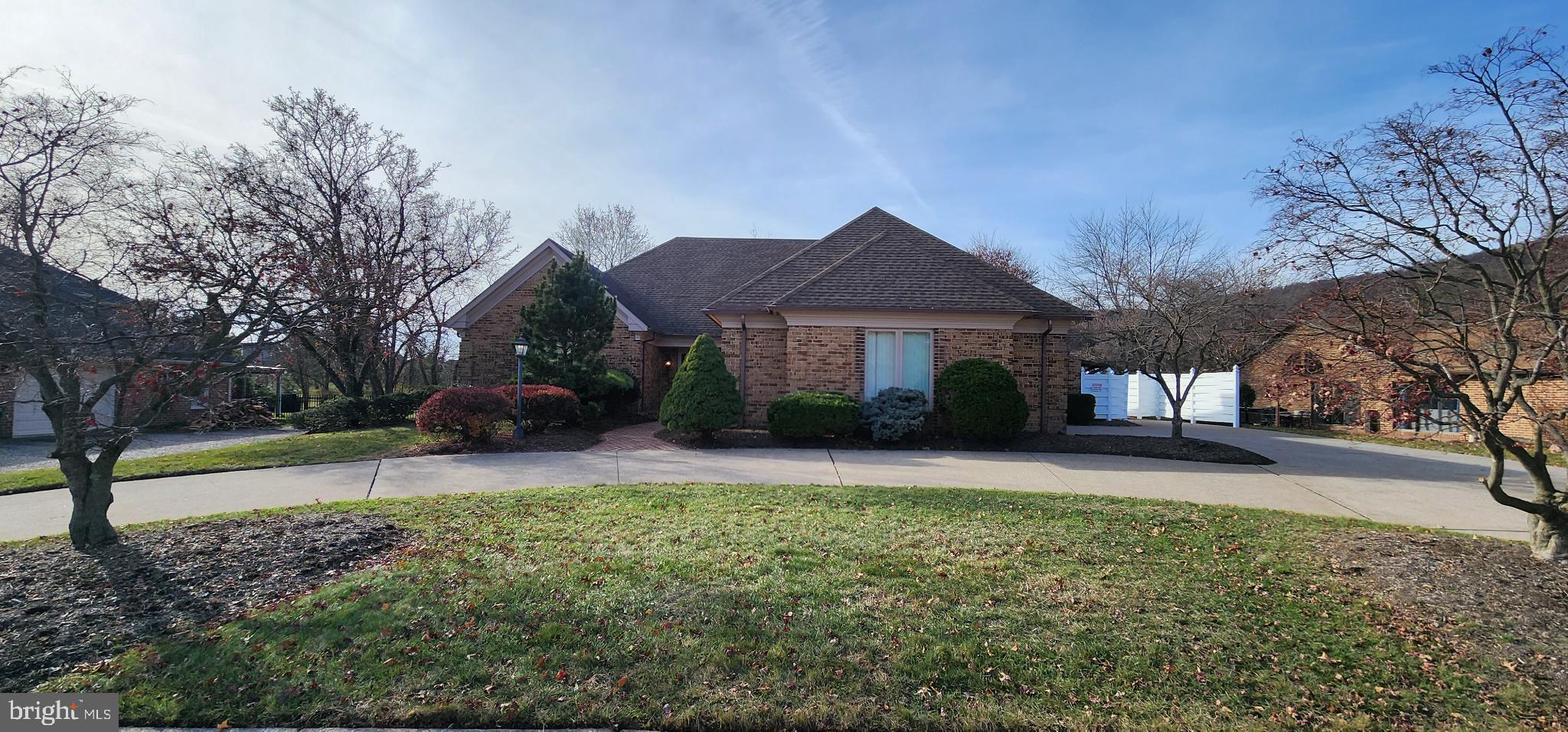4069 West Tilden Road Harrisburg, PA 17110 - Photo 53 of 56 a front view of a house with a yard and trees