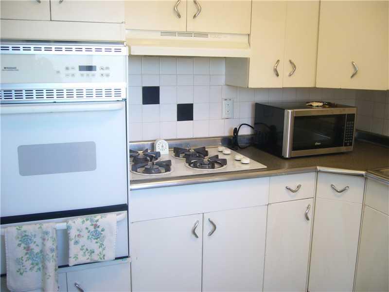 108 North Branch Road Monaca, PA 15061 - Photo 4 of 13 Kitchen. Cozy and a little vintage kitchen, newer gas stove and wall oven.