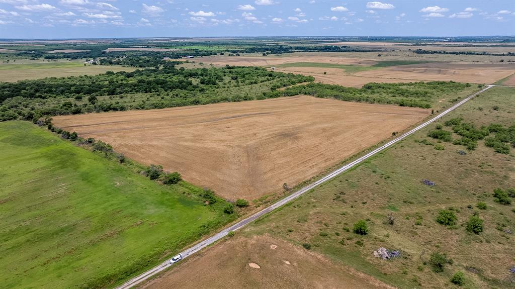 2 Scobee Road Olney, TX 76374 - Photo 6 of 23 a view of a big yard with an ocean view