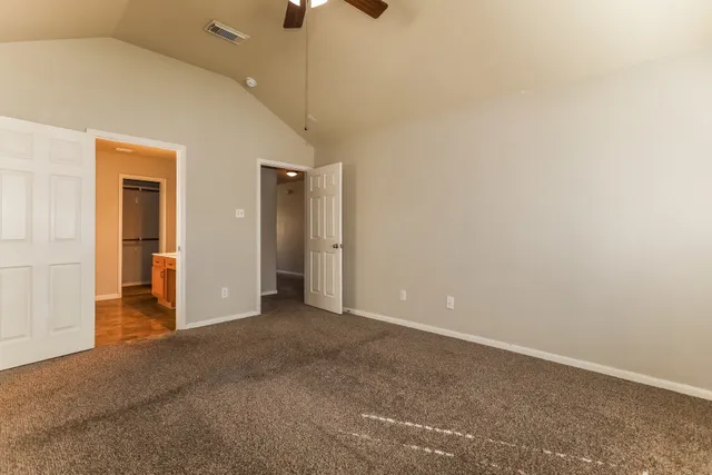 a view of a room with racks on the wall