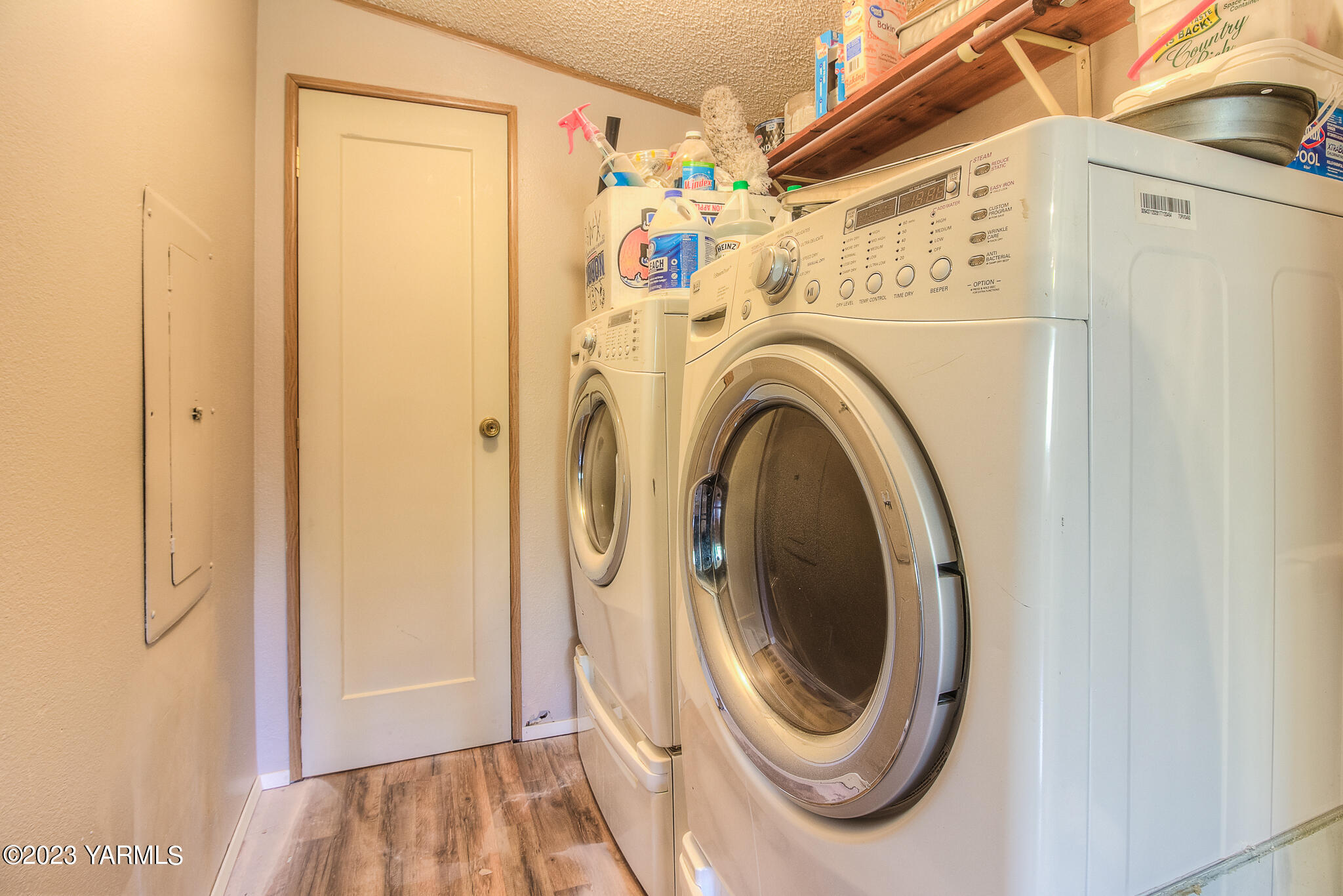 1710 North Fork Road Yakima, WA 98903 - Photo 15 of 34 a view of a storage & utility room with dryer and washer