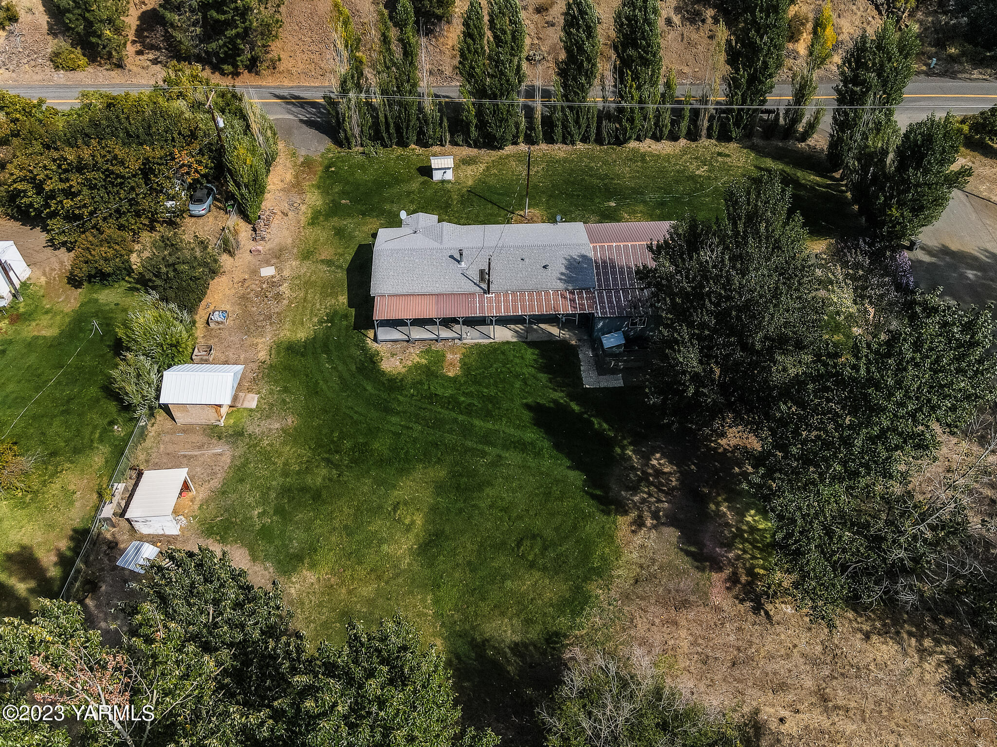 1710 North Fork Road Yakima, WA 98903 - Photo 30 of 34 an aerial view of a house with a yard