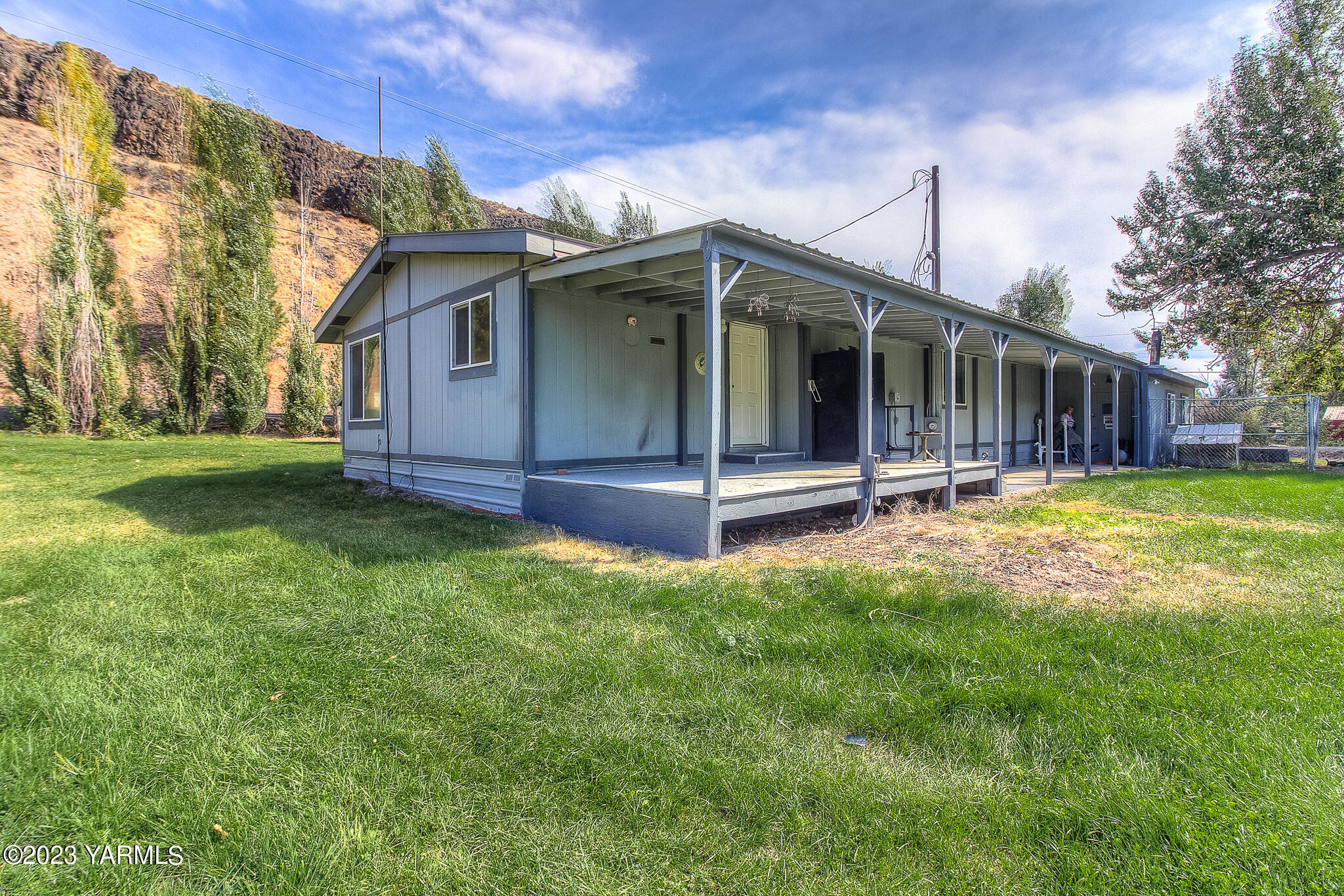 1710 North Fork Road Yakima, WA 98903 - Photo 4 of 34 a view of a house with a yard