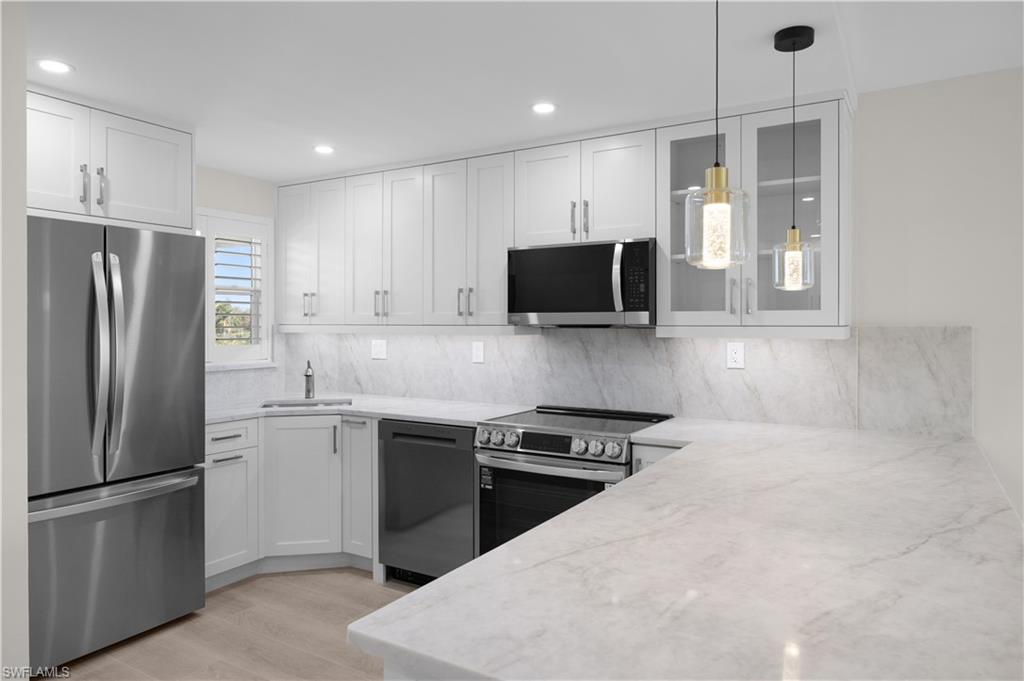 21 High Point Circle East, Unit 409 Naples, FL 34103 - Photo 22 of 38