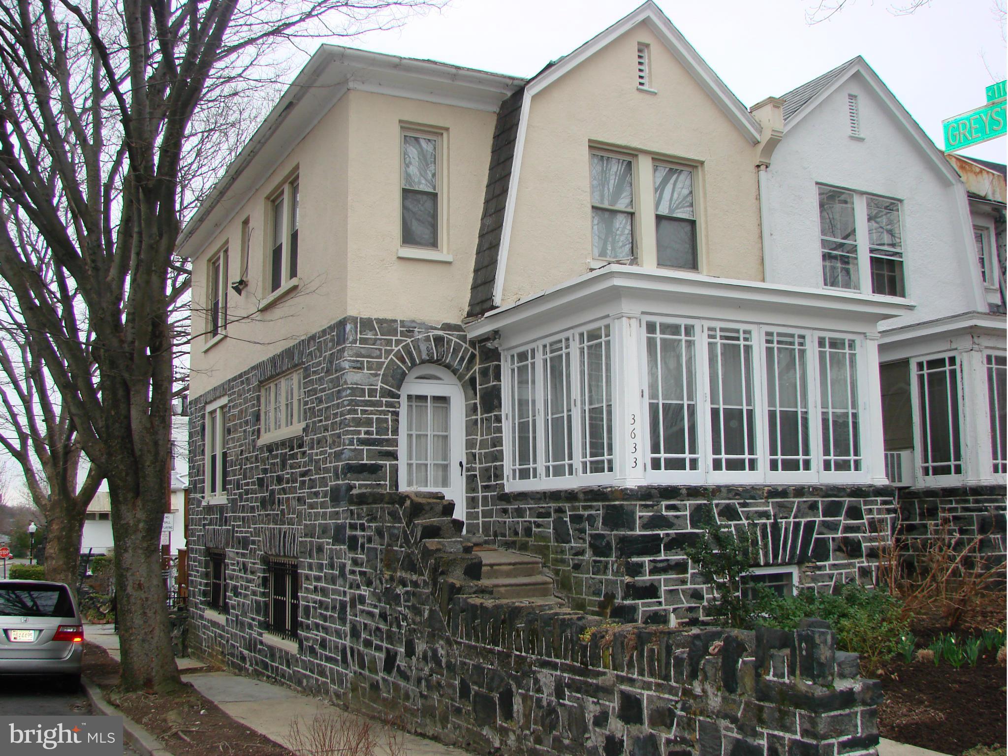3633 Yolando Road Baltimore, MD 21218 - Photo 1 of 24 a front view of a building with lot of cars and trees