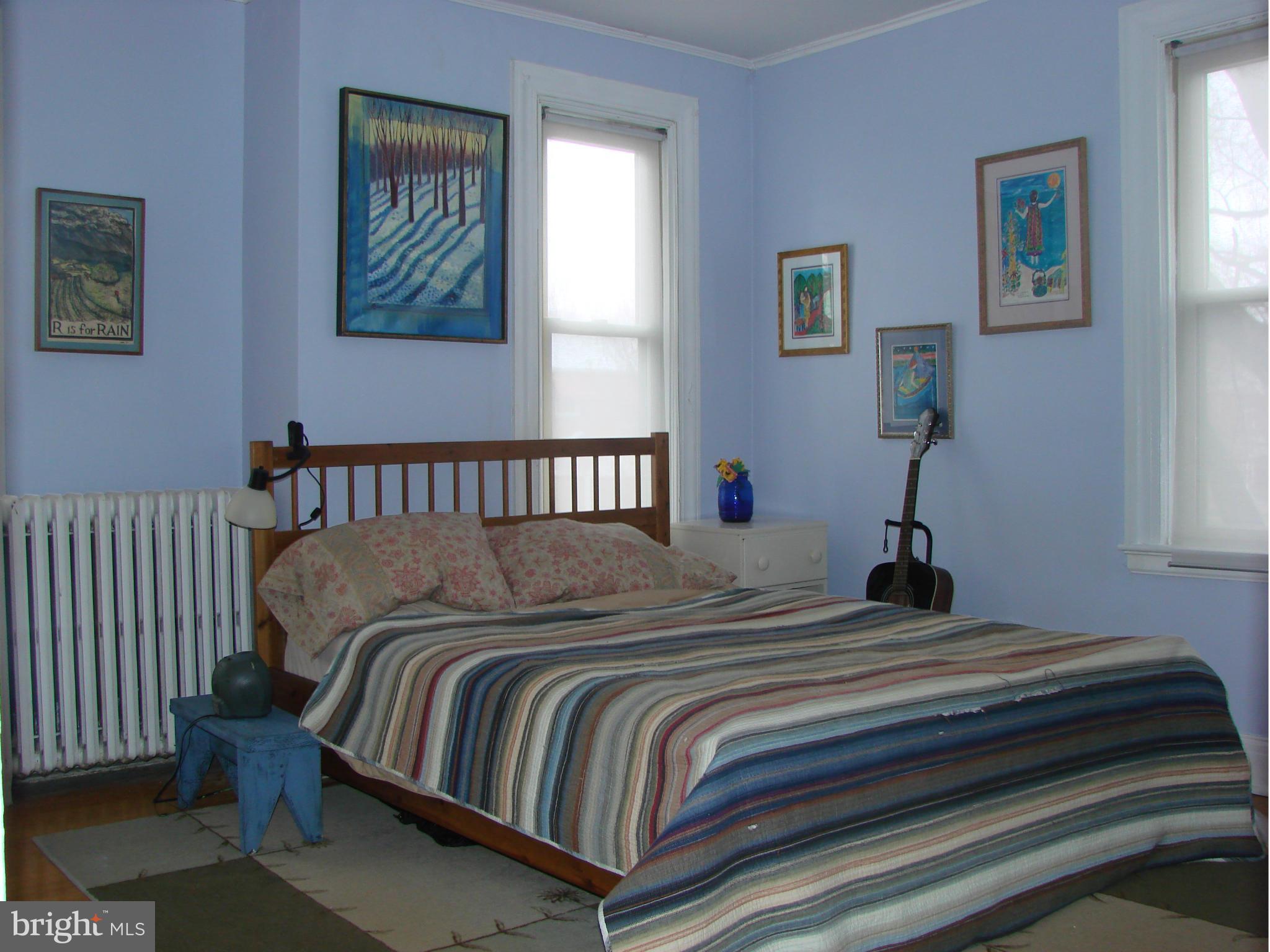 3633 Yolando Road Baltimore, MD 21218 - Photo 16 of 24 a bedroom with bed and a window