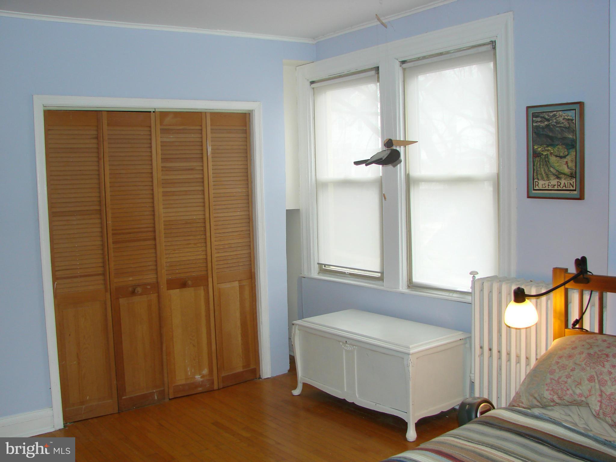 3633 Yolando Road Baltimore, MD 21218 - Photo 18 of 24 a spacious bedroom with a bed and a window