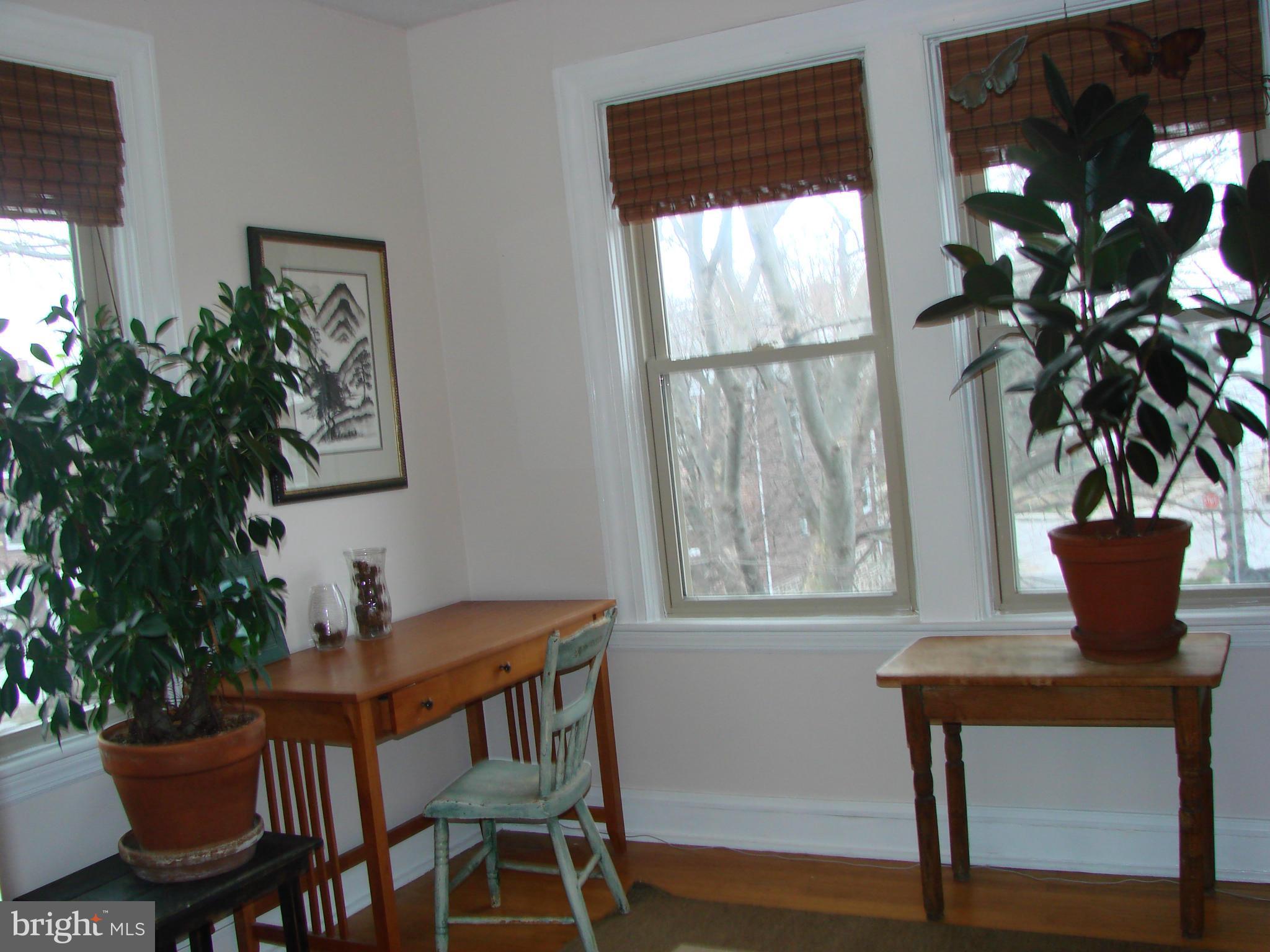 3633 Yolando Road Baltimore, MD 21218 - Photo 20 of 24 a view of a dining room with furniture window and wooden floor