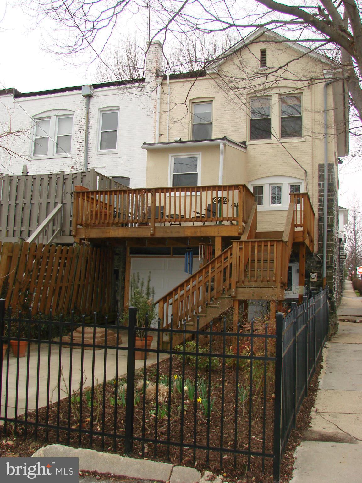 3633 Yolando Road Baltimore, MD 21218 - Photo 3 of 24 a view of a white building with many windows