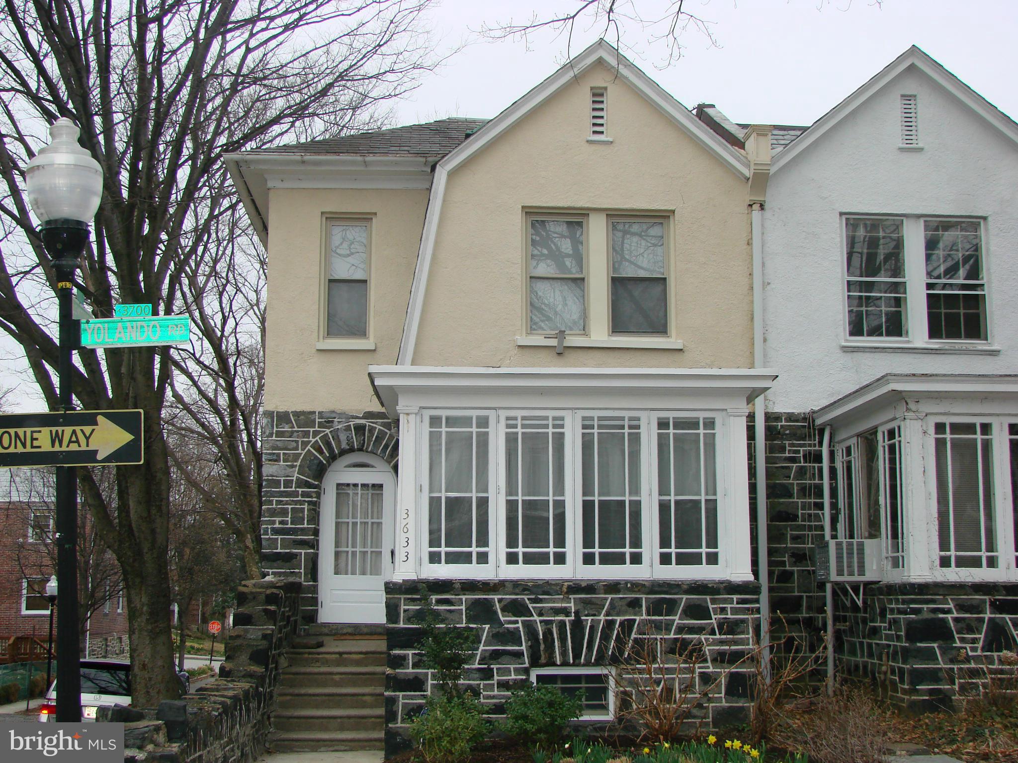 3633 Yolando Road Baltimore, MD 21218 - Photo 22 of 24 front view of a house with a street