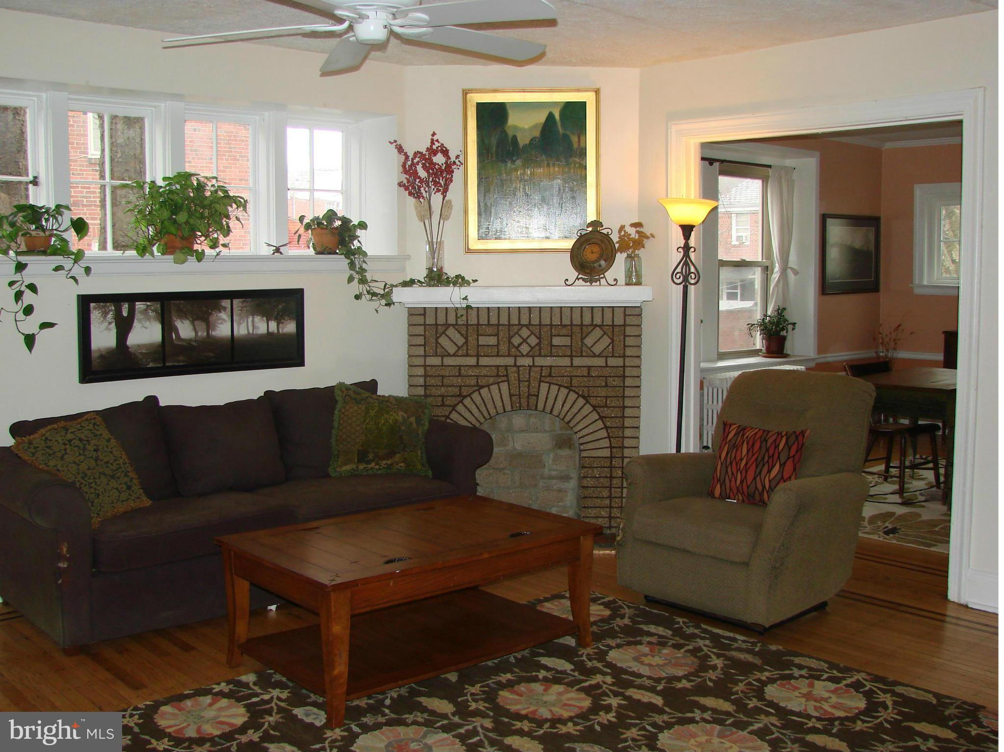 3633 Yolando Road Baltimore, MD 21218 - Photo 4 of 24 a living room with furniture and a fireplace