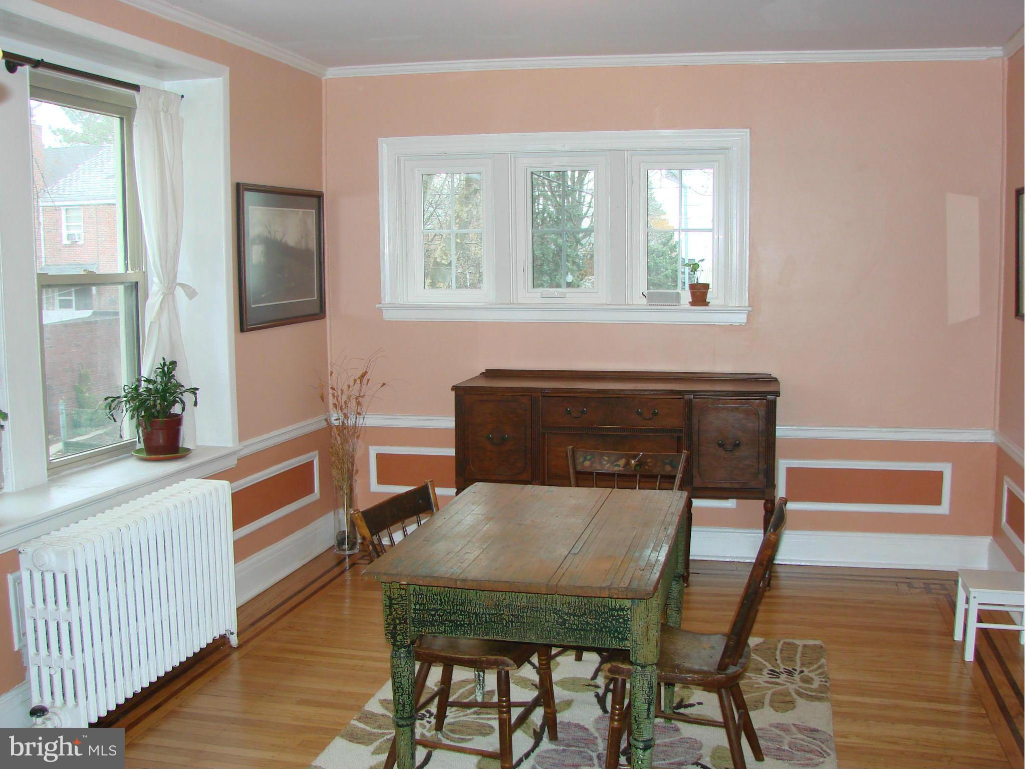 3633 Yolando Road Baltimore, MD 21218 - Photo 8 of 24 a view of a dining room with furniture and wooden floor