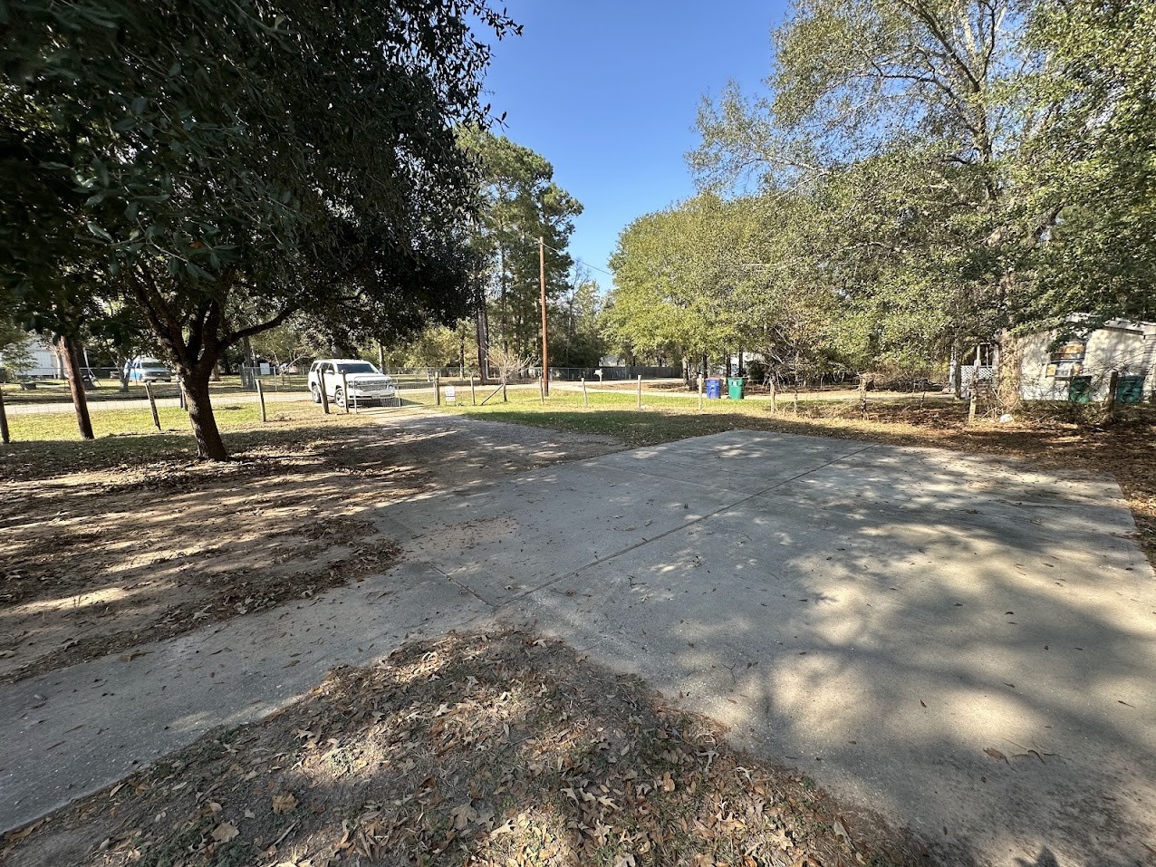 26518 McIntosh Road Magnolia, TX 77355 - Photo 16 of 17 a view of a yard with a tree