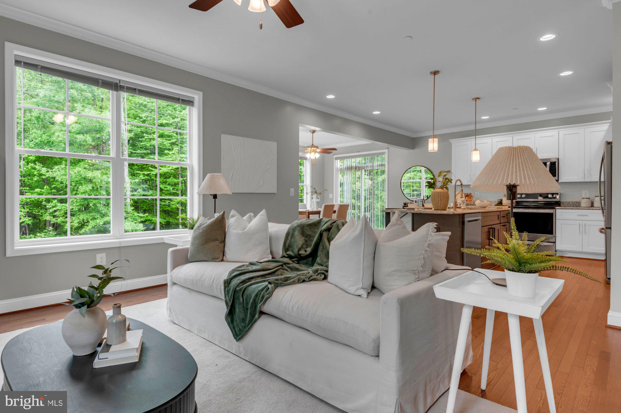 505 Brewerton Lane Edgewater, MD 21037 - Photo 12 of 78 a living room with furniture kitchen view and a large window