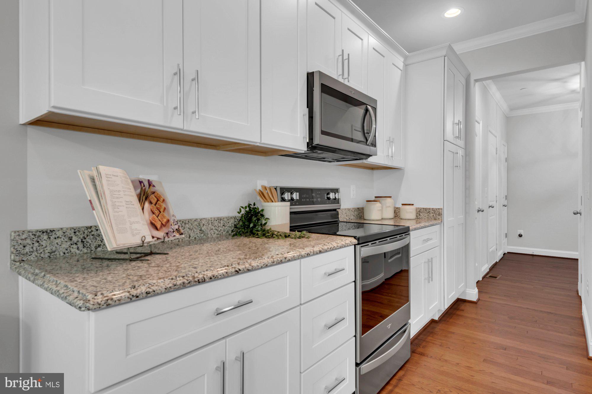 505 Brewerton Lane Edgewater, MD 21037 - Photo 15 of 78 a kitchen with stainless steel appliances granite countertop a sink and a stove