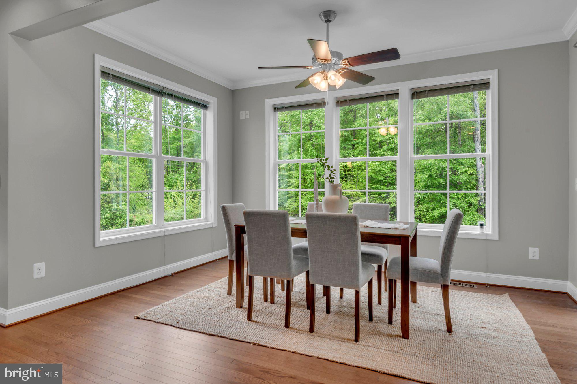 505 Brewerton Lane Edgewater, MD 21037 - Photo 19 of 78 a view of a dining room with furniture window and wooden floor