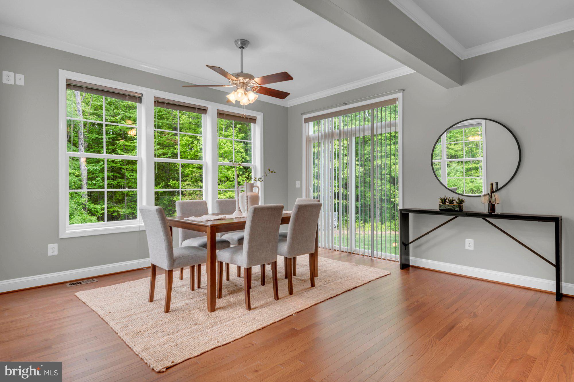 505 Brewerton Lane Edgewater, MD 21037 - Photo 20 of 78 a view of a dining room with furniture window and wooden floor