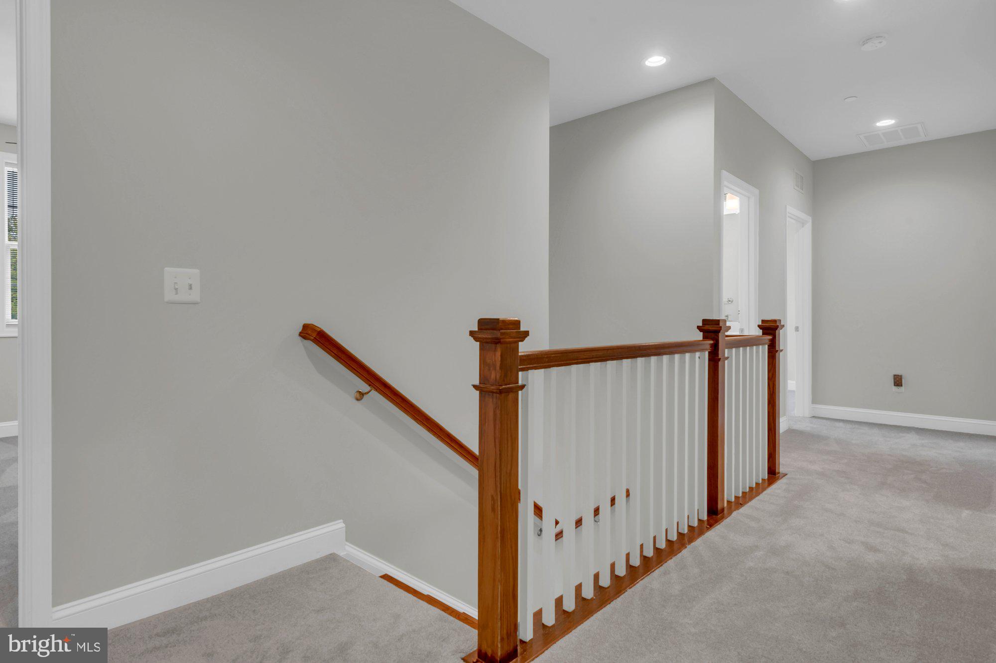 505 Brewerton Lane Edgewater, MD 21037 - Photo 29 of 78 a view of a hallway with staircase