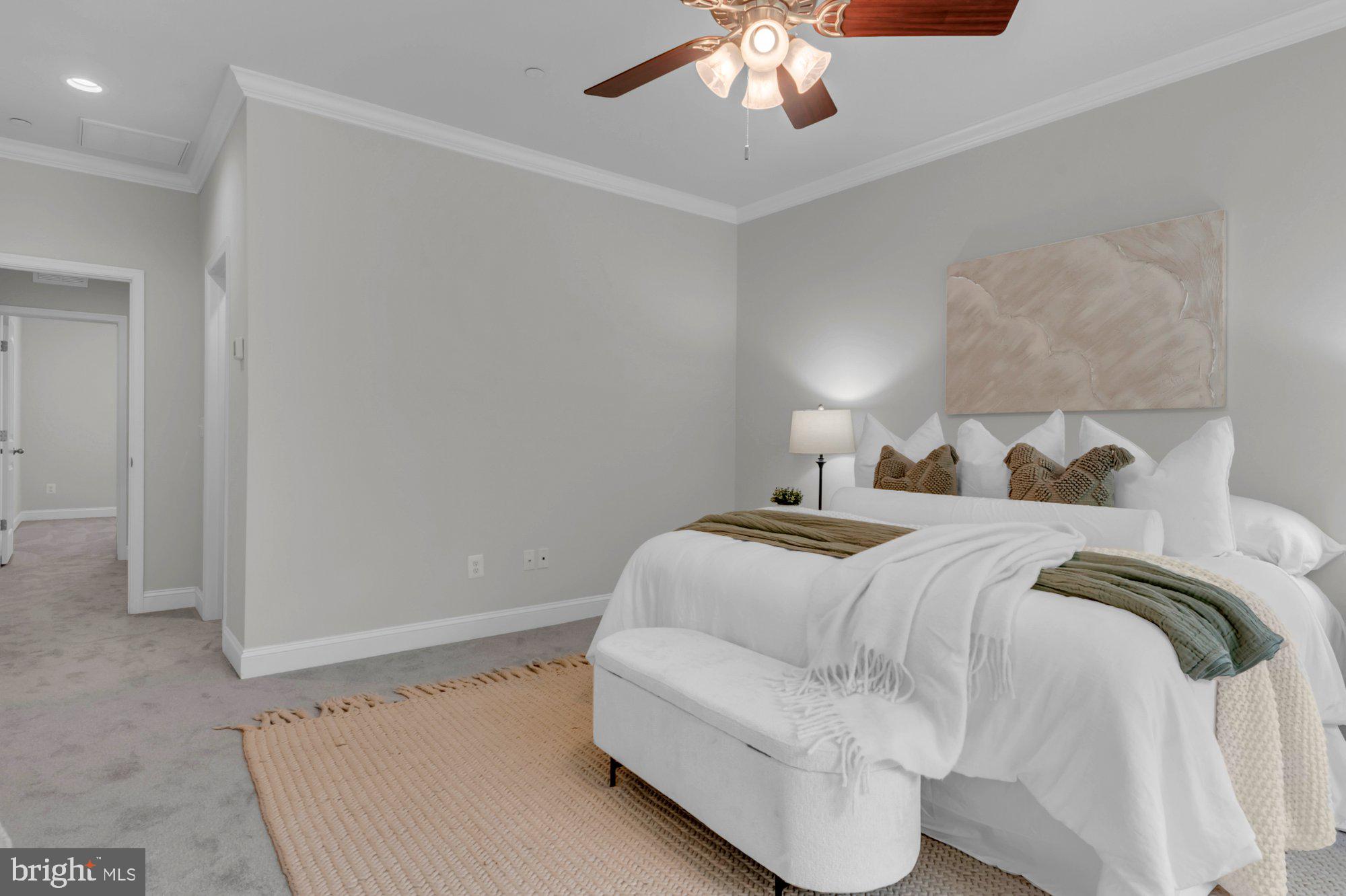 505 Brewerton Lane Edgewater, MD 21037 - Photo 31 of 78 a bedroom with a bed and chandelier