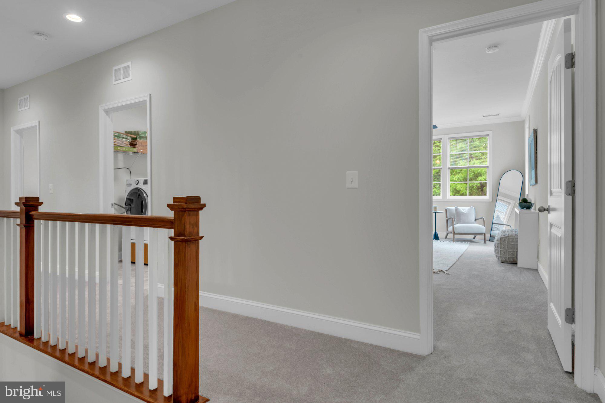 505 Brewerton Lane Edgewater, MD 21037 - Photo 48 of 78 a view of a hallway with a livingroom and a fireplace