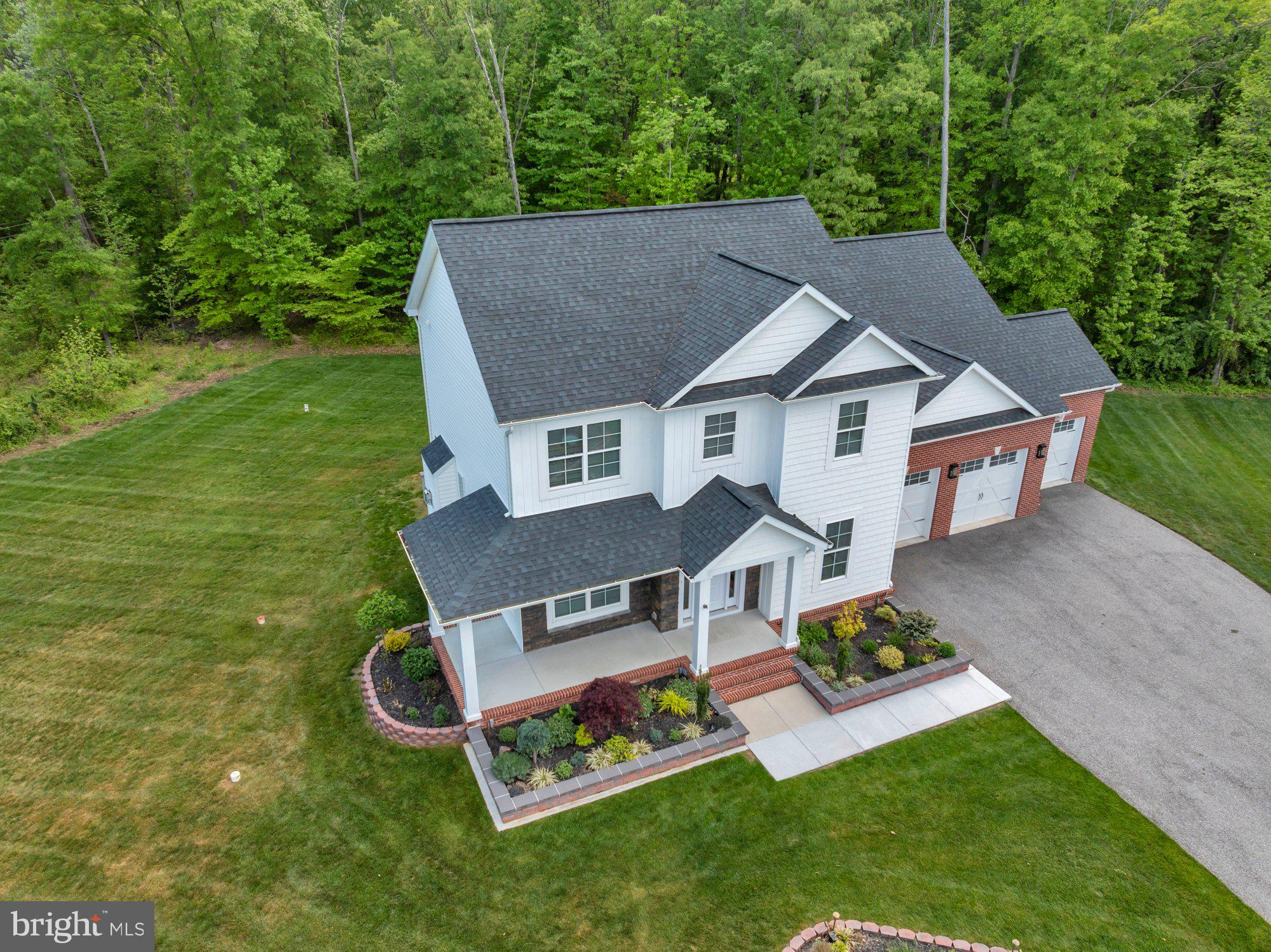 505 Brewerton Lane Edgewater, MD 21037 - Photo 54 of 78 a aerial view of a house with swimming pool next to a big yard